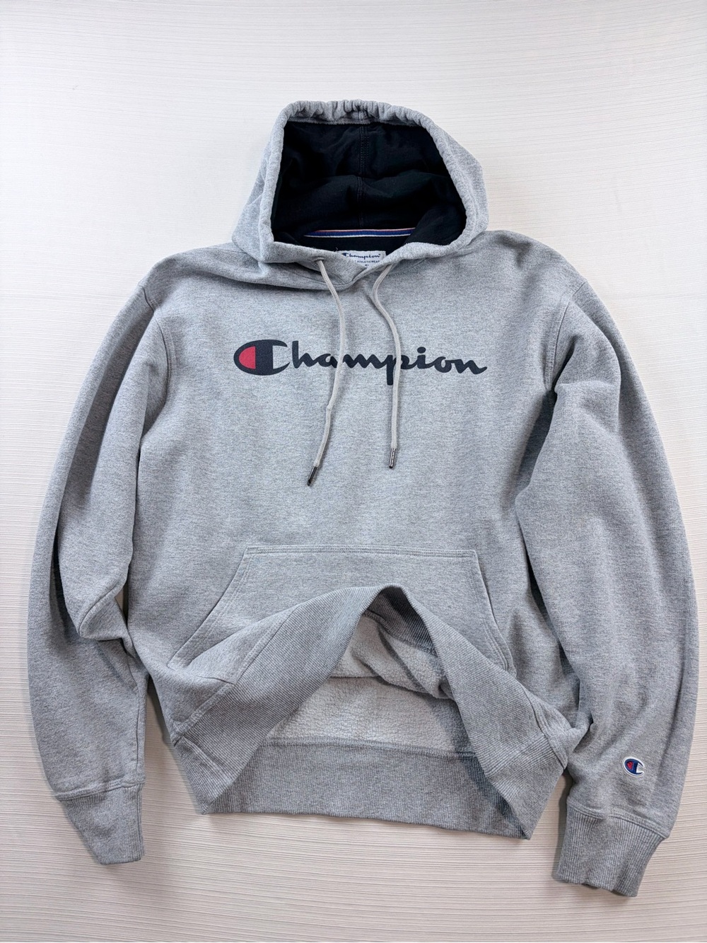 Champion Gray Hoodie with Iconic Script Logo and Red Accent